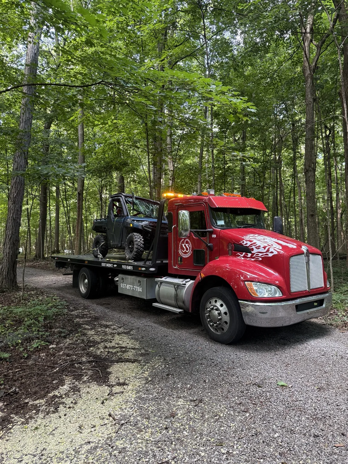 JJ’s flatbed transporting equipment