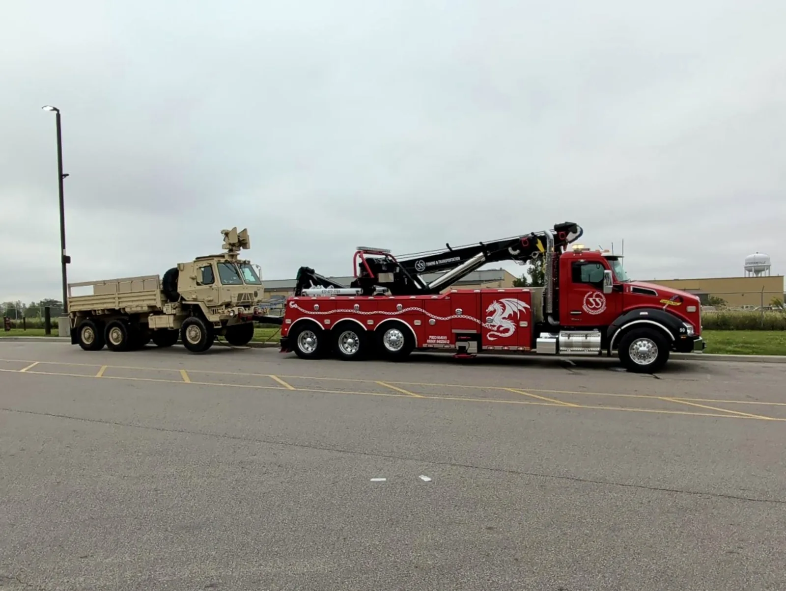JJ’s heavy wrecker towing a large vehicle